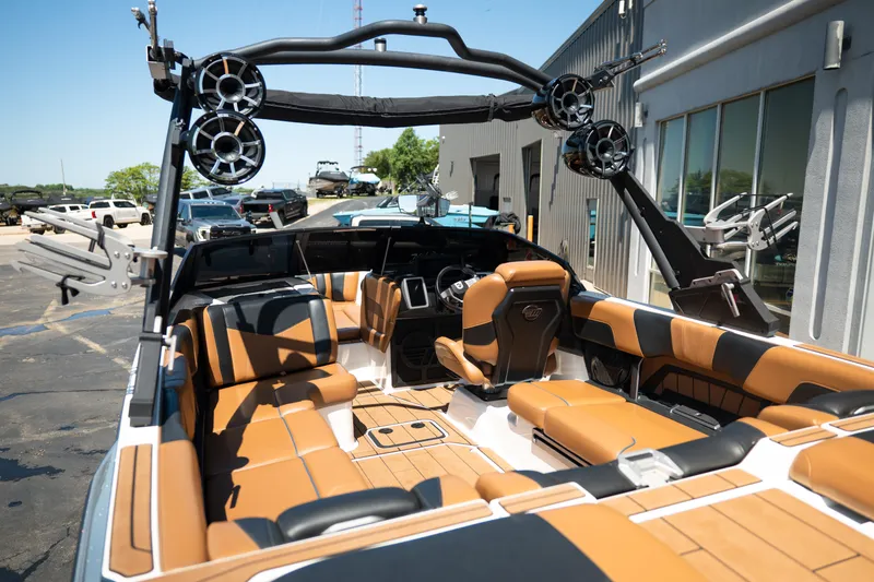 Slide: The Image of 2022 Malibu Wakesetter 23 MXZ boat with luxurious tan and black interior. - 12