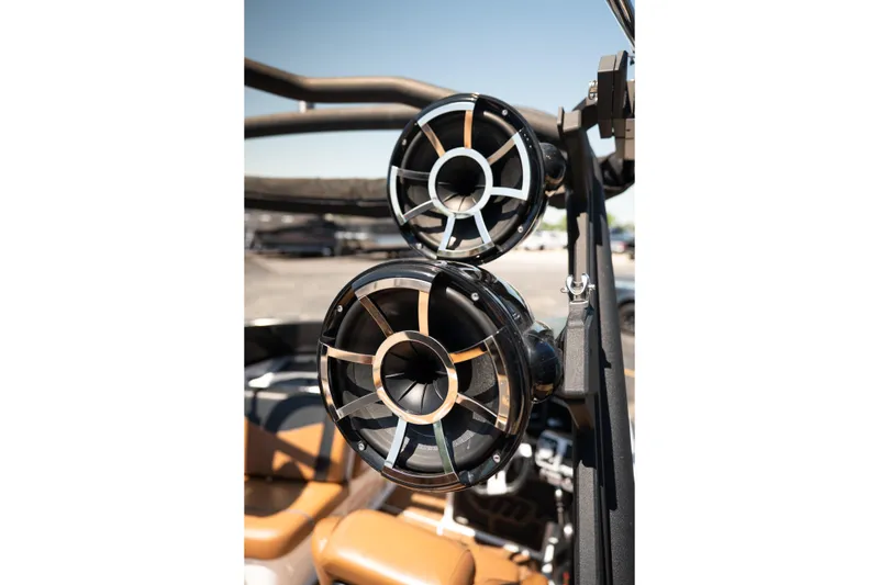 Slide: The Image of 2022 Malibu Wakesetter 23 MXZ boat speakers, close-up view, showcasing sleek design and craftsmanship. - 16