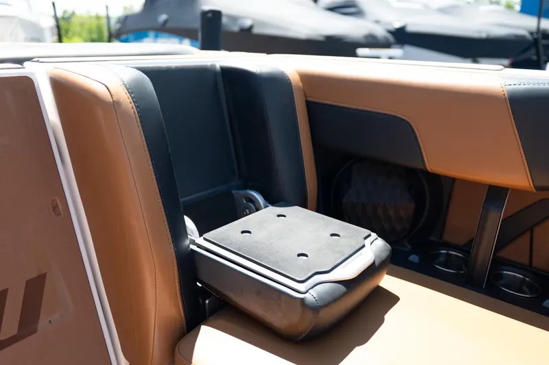 Slide: The Image of 2022 Malibu Wakesetter 23 MXZ interior seating detail with cup holders. - 30