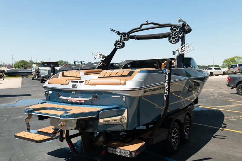 Slide: The Image of 2022 Malibu Wakesetter 23 MXZ boat with sleek design and advanced wakeboarding features. - 7