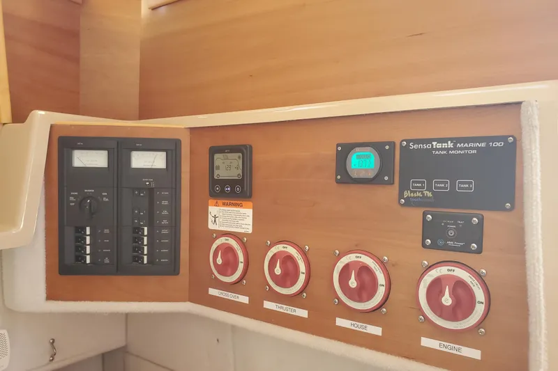 Slide: The Image of Control panel of a 2013 Cutwater 26 boat with SensaTank Marine 100 monitor. - 18