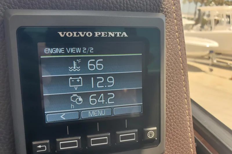 Slide: The Image of Volvo Penta engine display on 2013 Cutwater 26 boat showing temperature, voltage, and hours. - 29