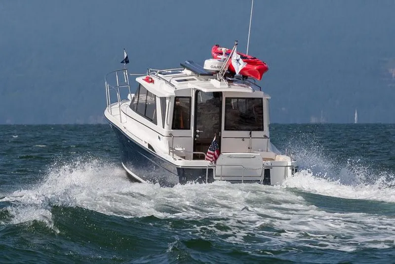 Slide: The Image of Manufacturer Provided Image: 2016 Cutwater 26 boat cruising on open water. - 39
