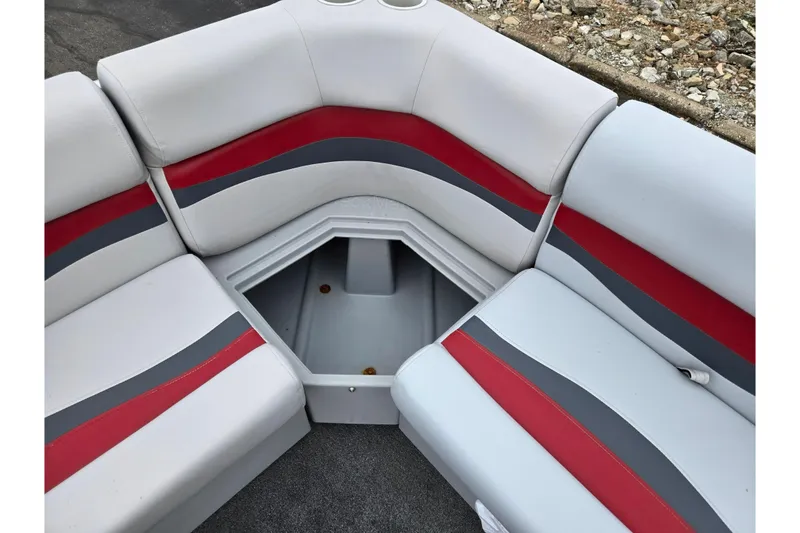 Slide: The Image of 2008 Sun Tracker Fishin' Barge 21 Signature Series seating with red and gray accents. - 15