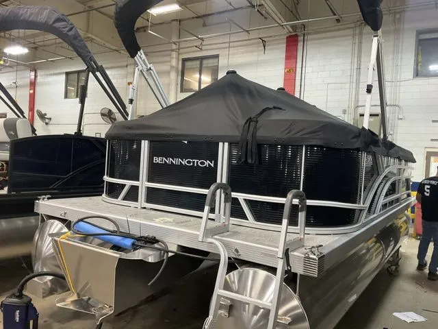 Slide: The Image of 2026 Bennington pontoon boat in warehouse, covered, model 20 S STERN RADIUS. - 15