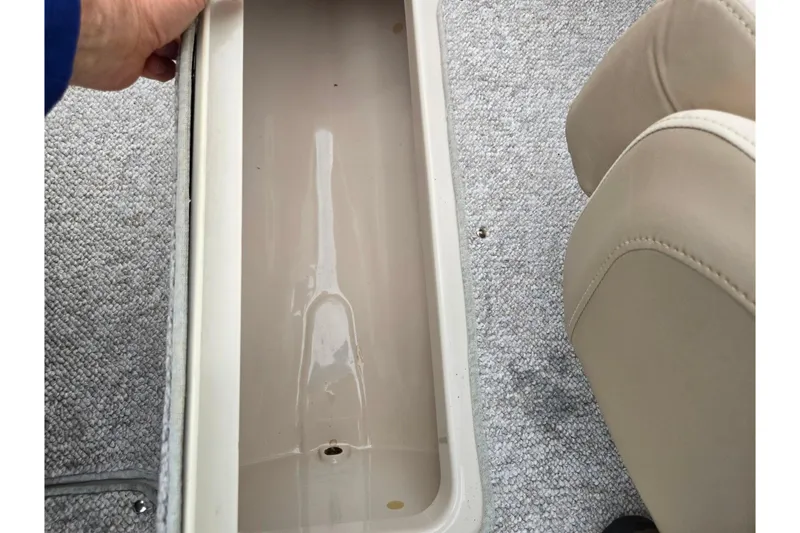 Slide: The Image of Storage compartment in 2005 Glastron GX 205 boat interior. - 12
