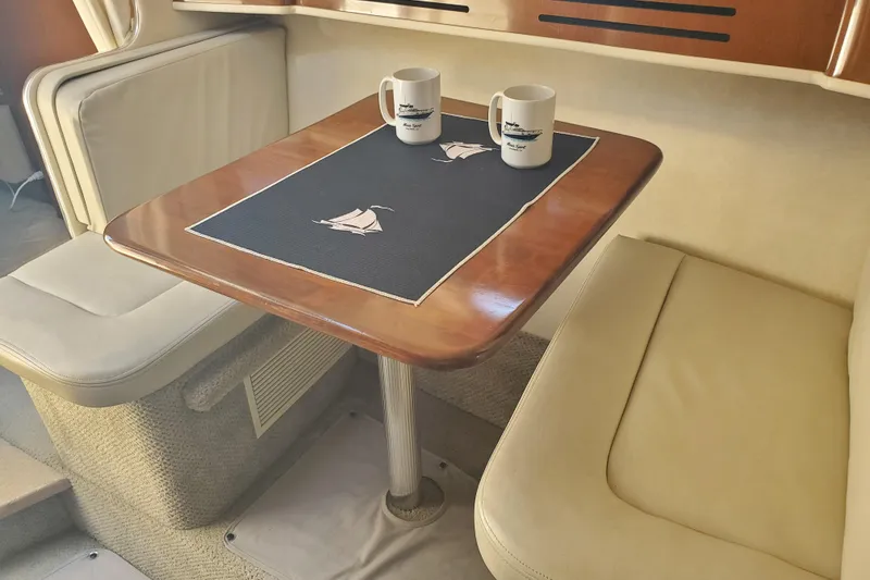 Slide: The Image of Interior of 2008 Sea Ray Sundancer 280 with table and two mugs. - 20