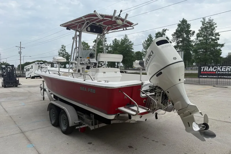 Slide: The Image of 2005 Sea Pro SV2100CC Bay Boat with Suzuki outboard motor on trailer. - 4