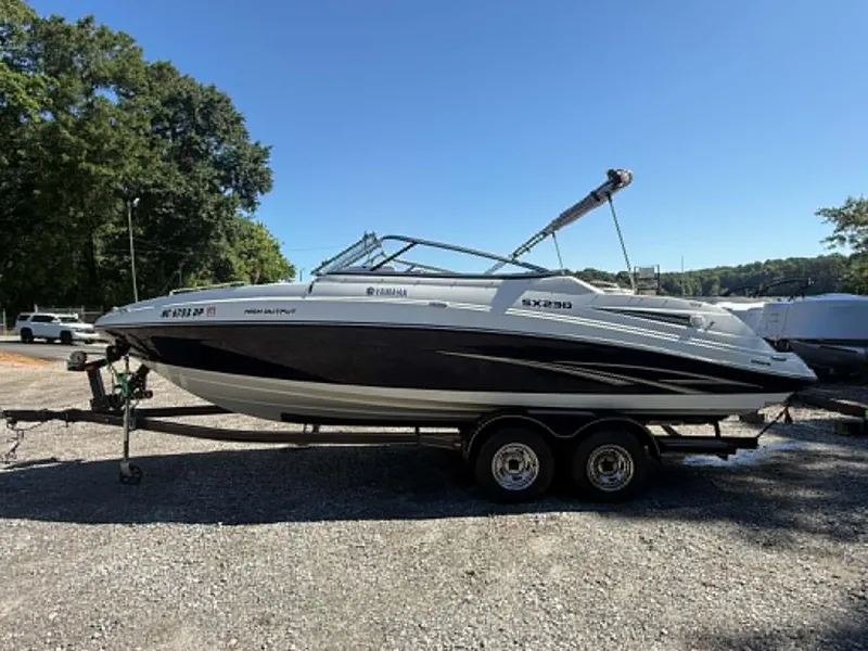 The Image of 2009 Yamaha SX 230 High Output boat on trailer. - 1