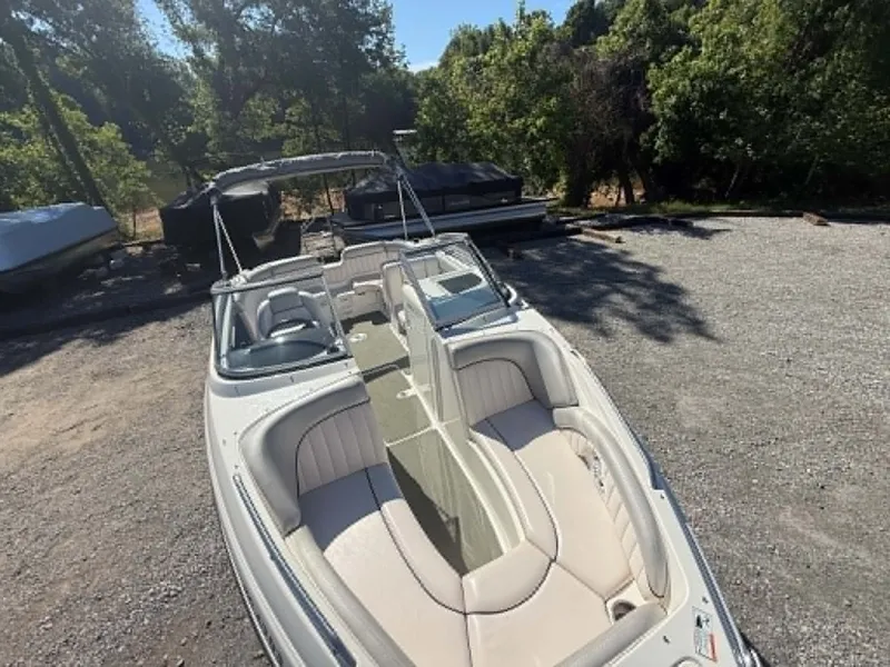 Slide: The Image of 2009 Yamaha SX 230 High Output boat on gravel lot. - 10