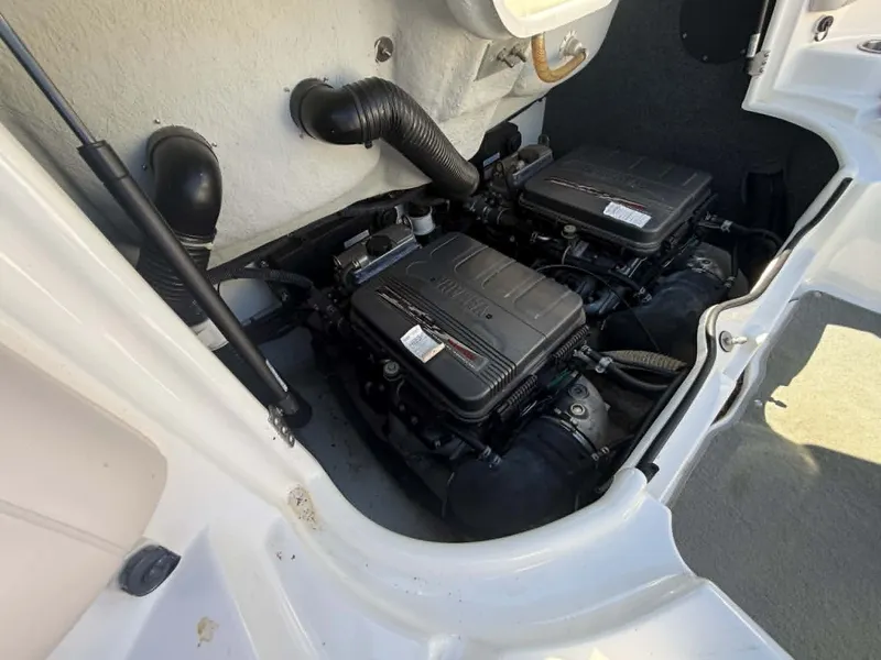 Slide: The Image of Engine compartment of a 2009 Yamaha SX 230 High Output boat. - 16