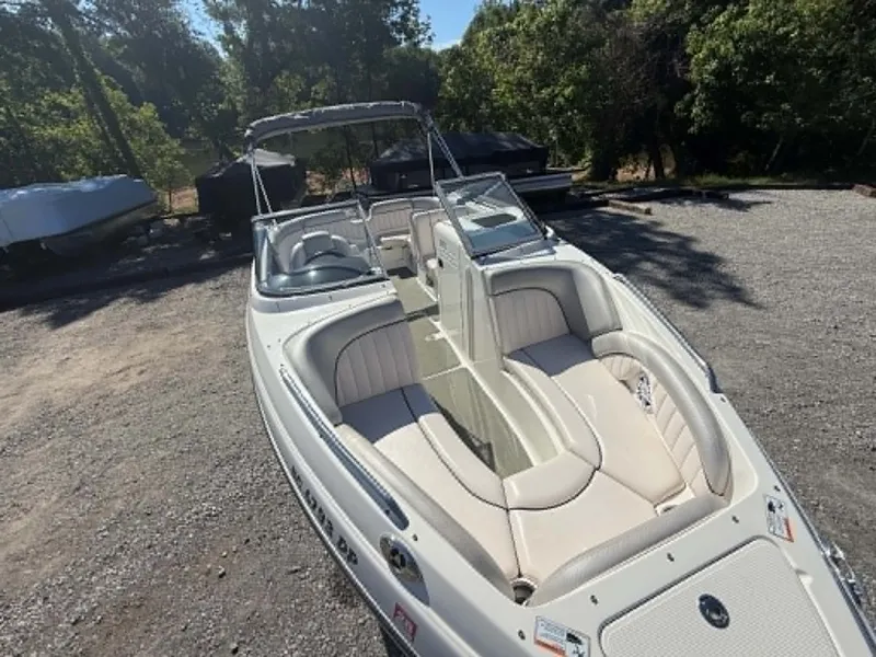 Slide: The Image of 2009 Yamaha SX 230 High Output boat on gravel lot. - 19