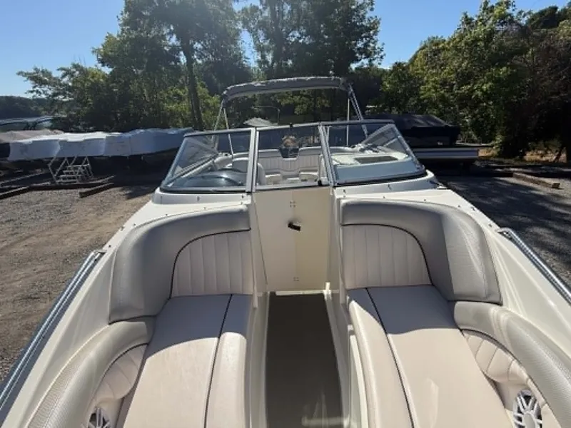 Slide: The Image of 2009 Yamaha SX 230 High Output boat with beige interior. - 25
