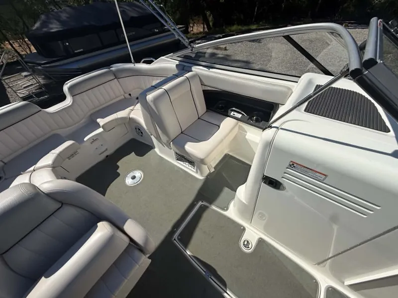 Slide: The Image of Interior of 2009 Yamaha SX 230 High Output boat, gray carpet, white seating. - 30