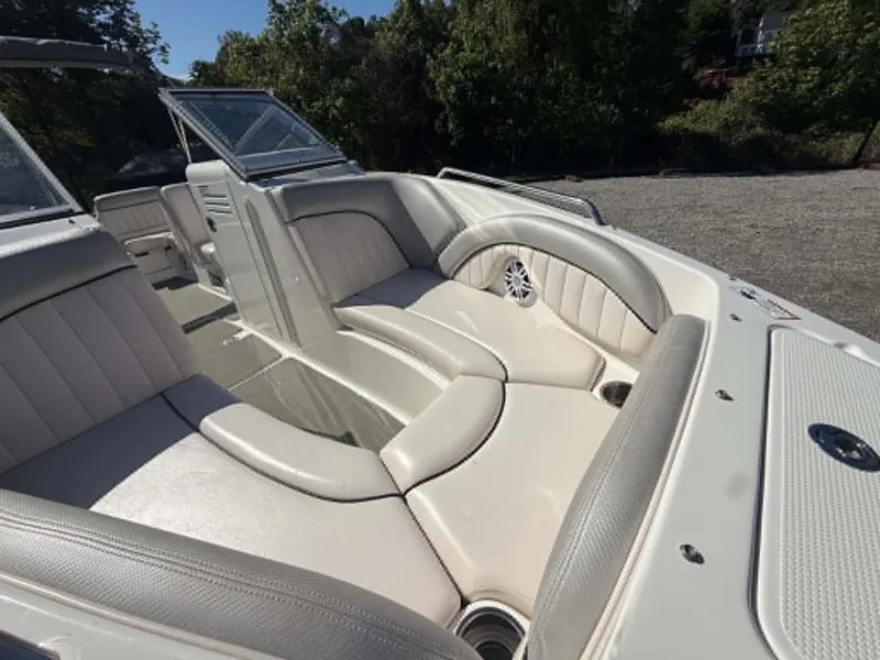 Slide: The Image of 2009 Yamaha SX 230 High Output boat interior with beige seating. - 7
