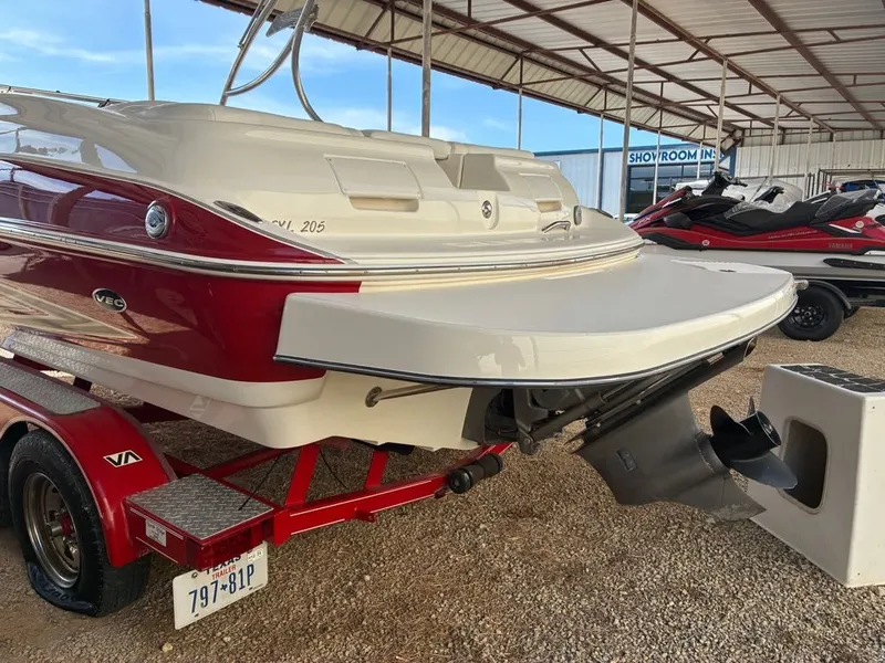 Slide: The Image of 2008 Glastron GX 205 boat on trailer in storage facility. - 7