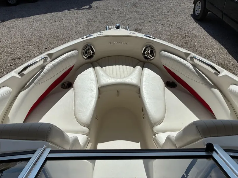 Slide: The Image of Interior of a 2008 Glastron GX 205 boat with white seating. - 8