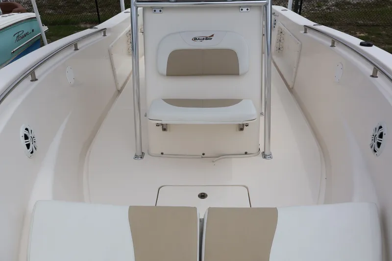 Slide: The Image of Interior view of a 2020 Bulls Bay 230CC boat with seating area. - 15