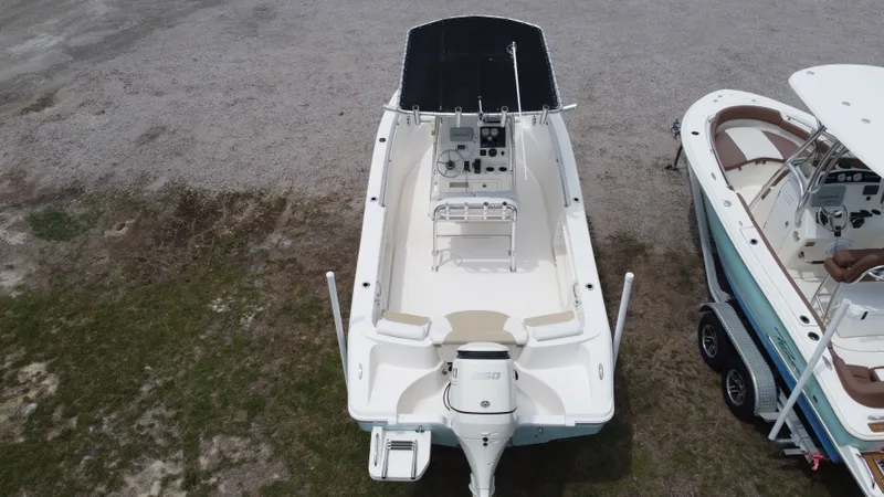 Slide: The Image of Aerial view of a 2020 Bulls Bay 230CC boat on dry land. - 2