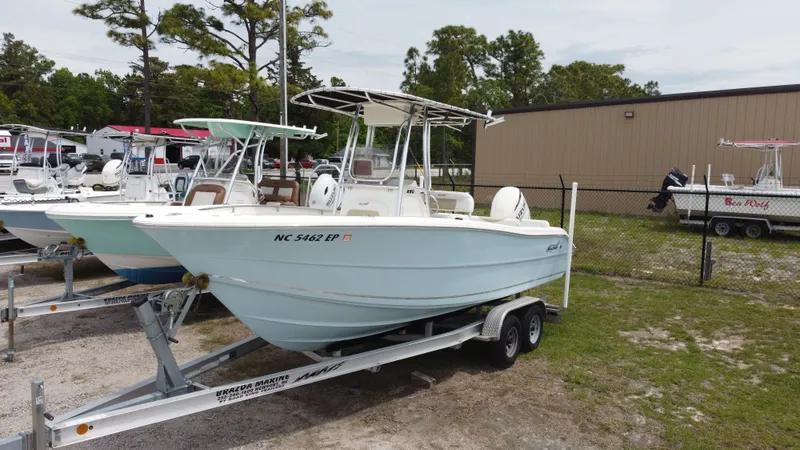 Slide: The Image of 2020 Bulls Bay 230CC boat on trailer outdoors. - 3