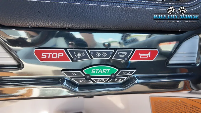 Slide: The Image of Close-up of a boat control panel with start and stop buttons and various symbols. - 47