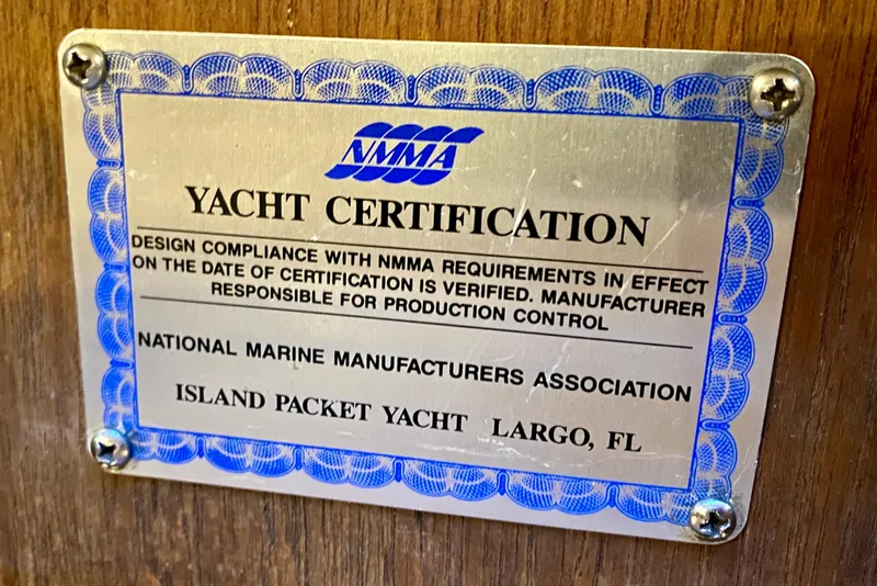 Slide: The Image of Yacht certification plaque for 1992 Island Packet 29, NMMA compliance, Largo, FL. - 84
