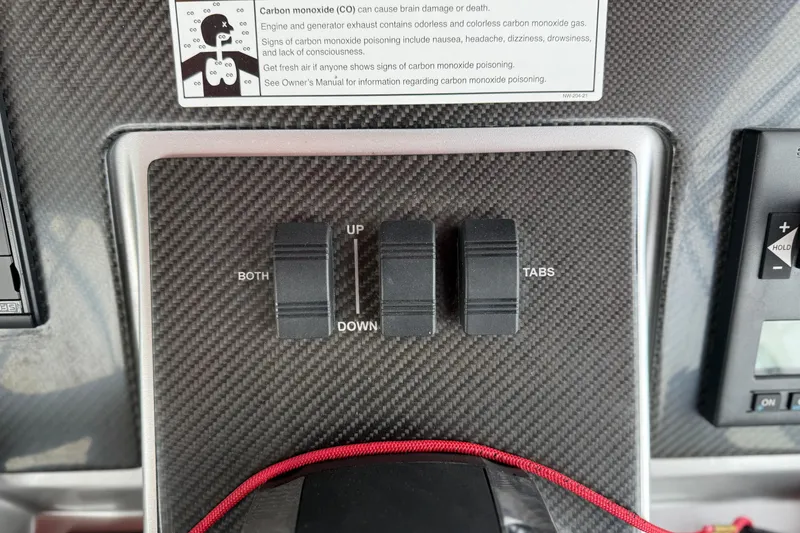 Slide: The Image of Control panel of 2022 Fountain 34 SC boat with carbon monoxide warning. - 19