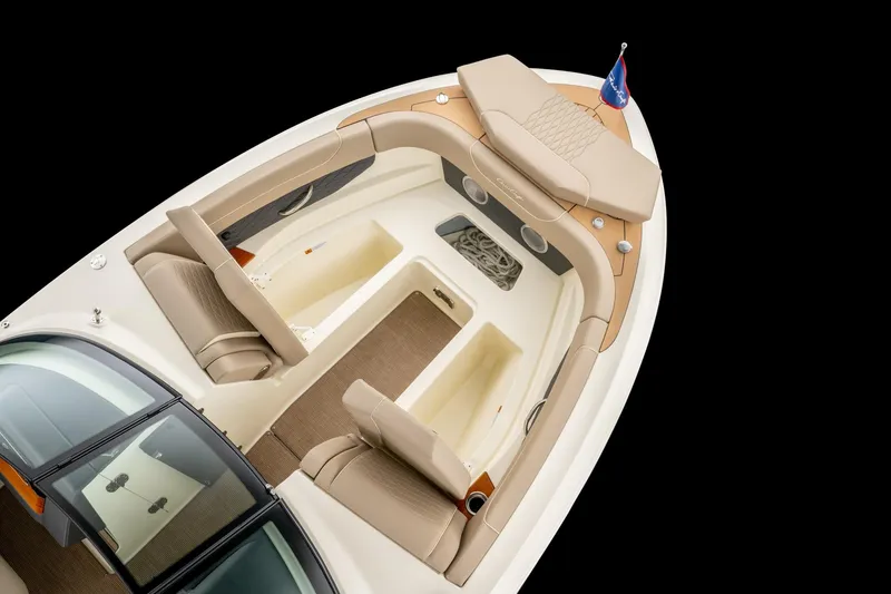 Slide: The Image of 2026 Chris-Craft Sportster 28 boat interior with beige seating and elegant design. - 10