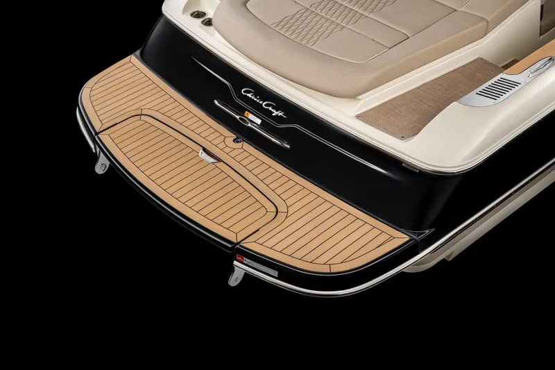 Slide: The Image of 2026 Chris-Craft Sportster 28 boat with elegant teak deck and luxurious seating. - 15