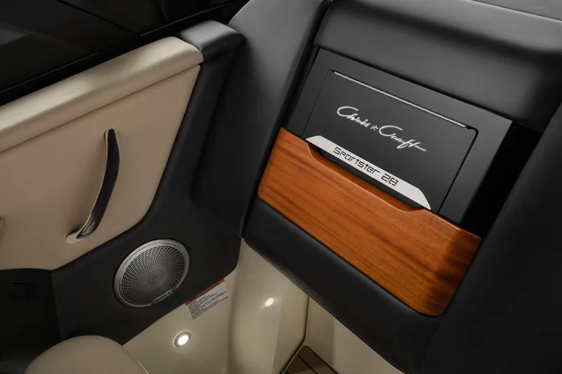 Slide: The Image of 2026 Chris-Craft Sportster 28 interior detail with elegant wood and leather accents. - 4