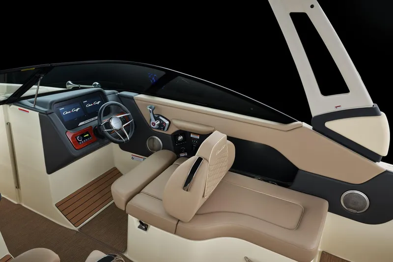 Slide: The Image of 2026 Chris-Craft Sportster 28 interior with modern dashboard and beige seating. - 7