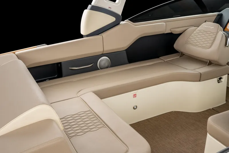Slide: The Image of Luxurious interior of 2026 Chris-Craft Sportster 28 boat with beige leather seating. - 9