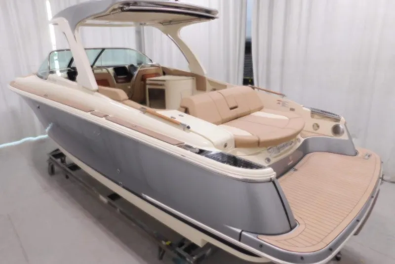 Slide: The Image of 2026 Chris-Craft Launch 31 GT luxury boat with elegant design and spacious seating. - 4