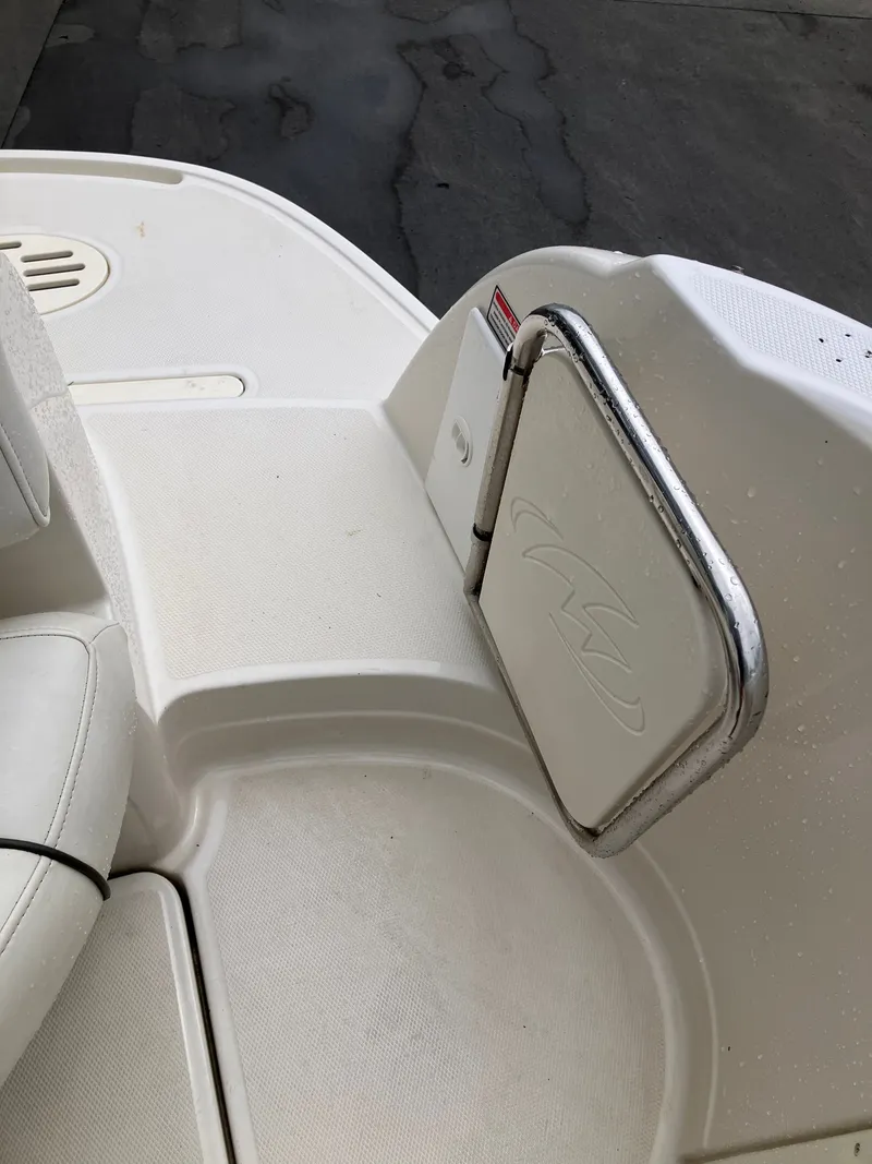 Slide: The Image of Rear deck of a 2006 Monterey 250 SC boat. - 12