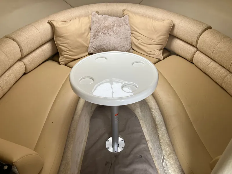 Slide: The Image of Interior of a 2006 Monterey 250 SC with beige sofa and table. - 27