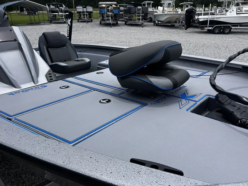 Slide: The Image of 2026 Xpress H17 boat with gray deck and blue accents. - 10