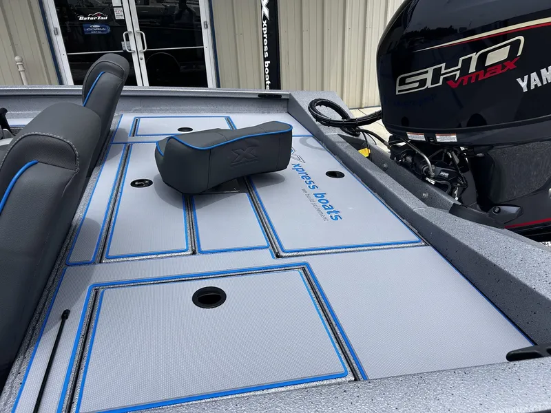 Slide: The Image of Xpress H17 boat 2026 with Yamaha motor and gray deck. - 6