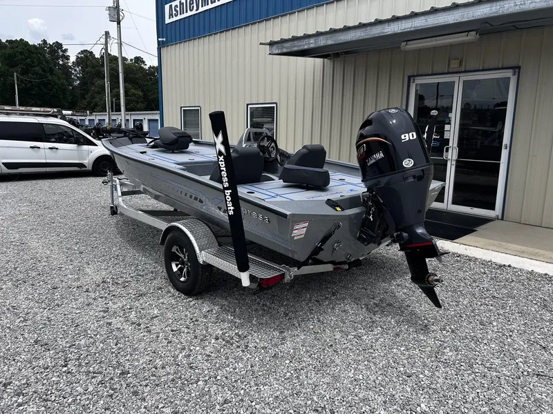 Slide: The Image of 2026 Xpress H17 boat with Yamaha motor on trailer. - 7
