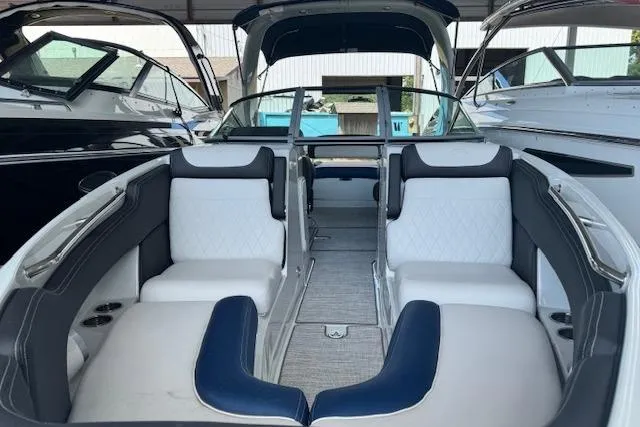 Slide: The Image of 2024 Crownline 290 SS boat interior with luxurious seating and modern design. - 10