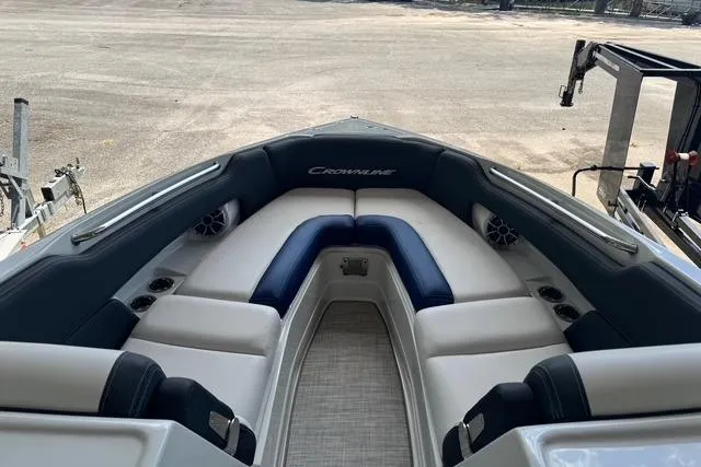 Slide: The Image of 2024 Crownline 290 SS boat interior with spacious seating and modern design. - 8