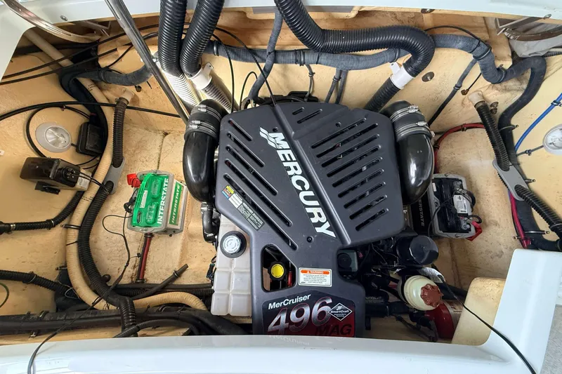 Slide: The Image of Engine compartment of a 2005 Formula 280 Bowrider with Mercury 496 MAG engine. - 4