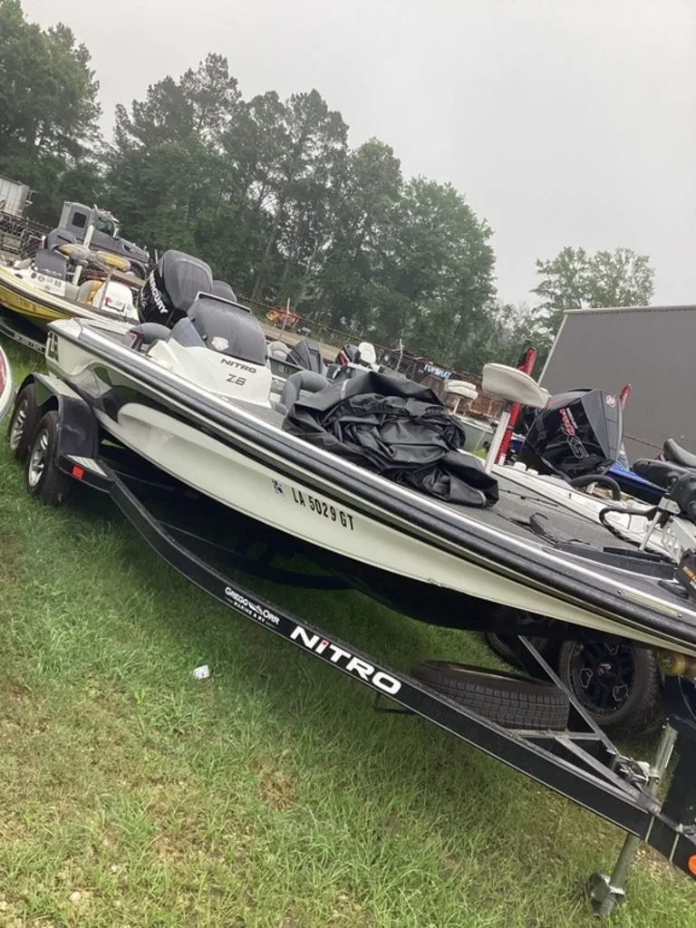 The Image of 2012 Nitro Z-8 boat parked on trailer outdoors. - 1