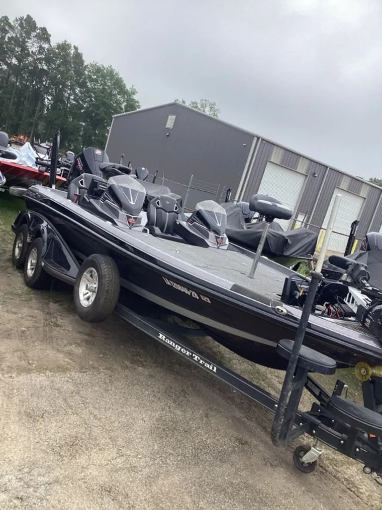 The Image of 2024 Ranger Z520R boat on trailer outside warehouse. - 1