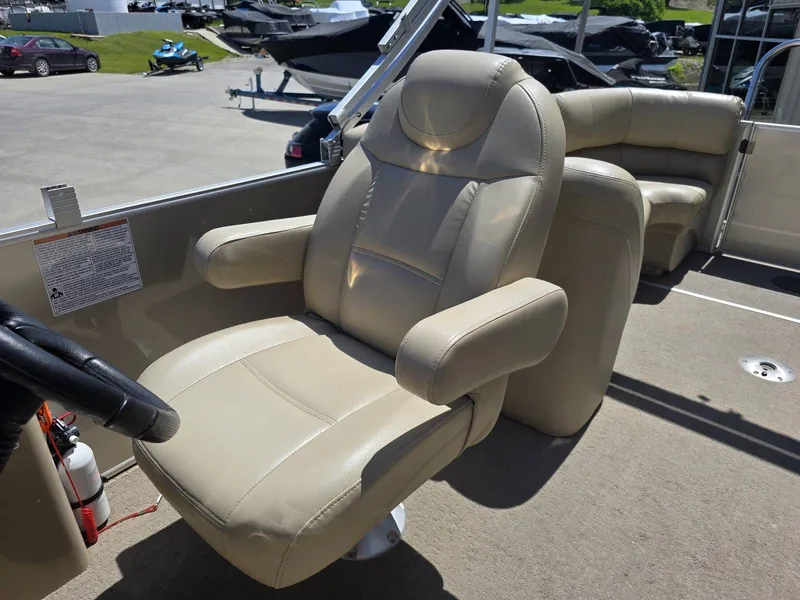 Slide: The Image of Beige leather seat on a 2015 Sylvan Mirage 8522 boat. - 16