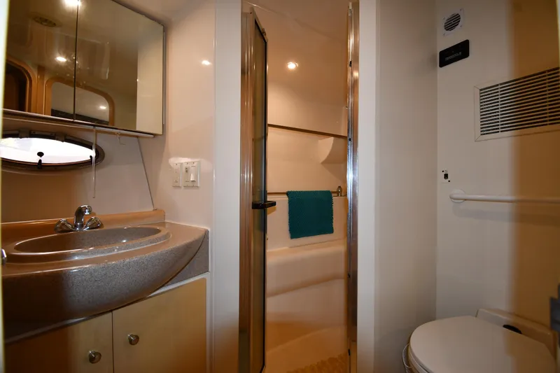 Slide: The Image of Bathroom interior of 2000 Carver 350 Mariner yacht with sink, shower, and toilet. - 34