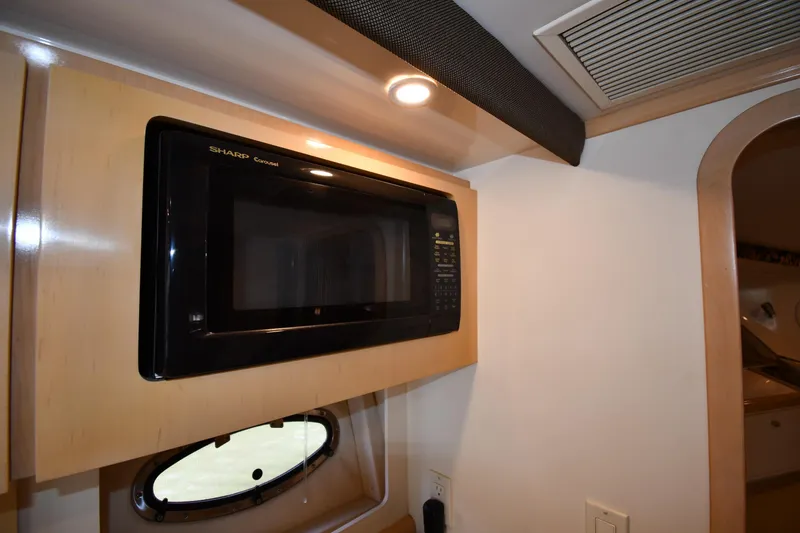 Slide: The Image of Microwave in 2000 Carver 350 Mariner yacht interior kitchen area. - 45