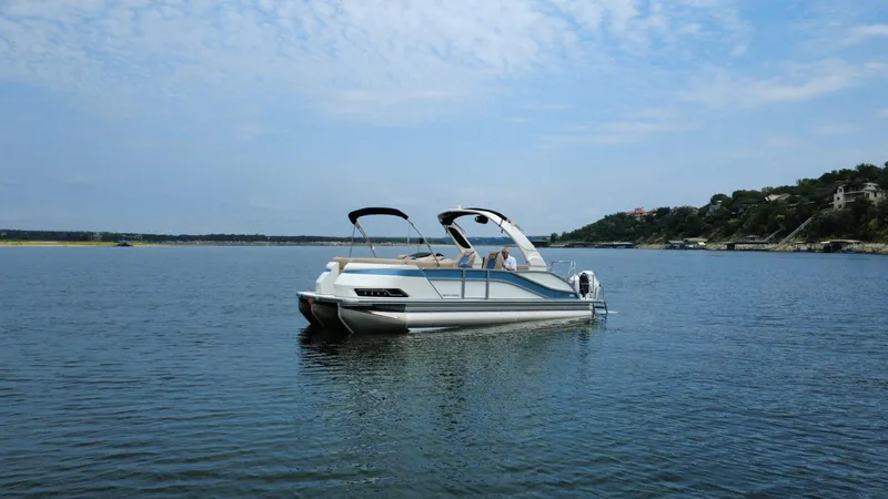 The Image of 2026 Harris Grand Mariner 230 on calm waters. - 1