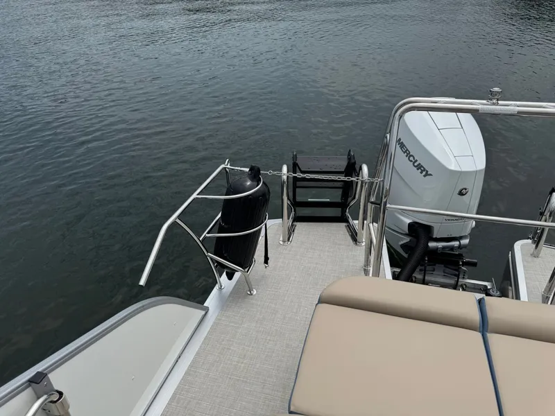 Slide: The Image of Rear view of Harris Grand Mariner 230 boat, model year 2026. - 10