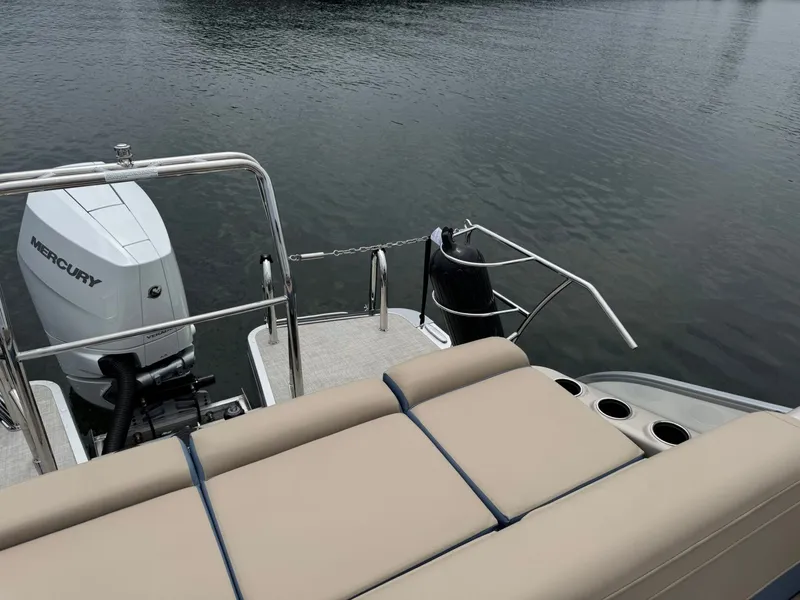 Slide: The Image of Rear view of Harris Grand Mariner 230 boat, model year 2026. - 11