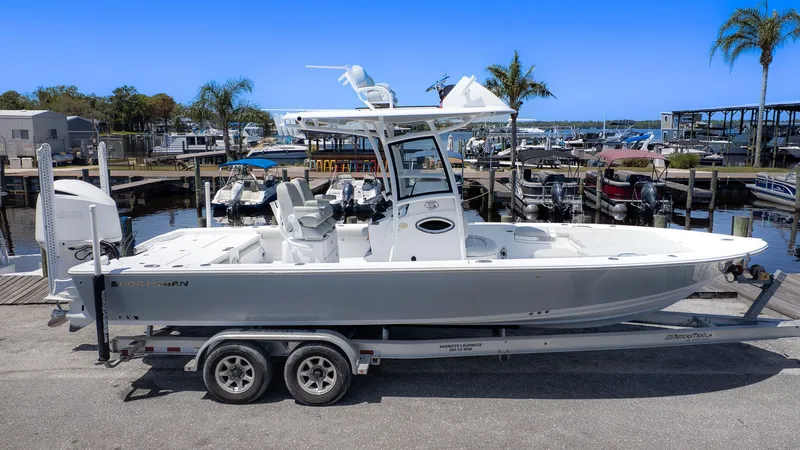 The Image of 2019 Sportsman Masters 267 Bay Boat on trailer at marina. - 1